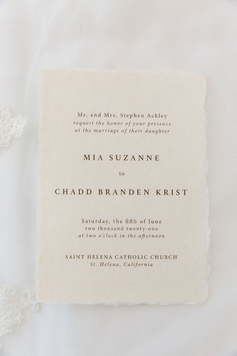 Close up shot of the couples wedding invitation.