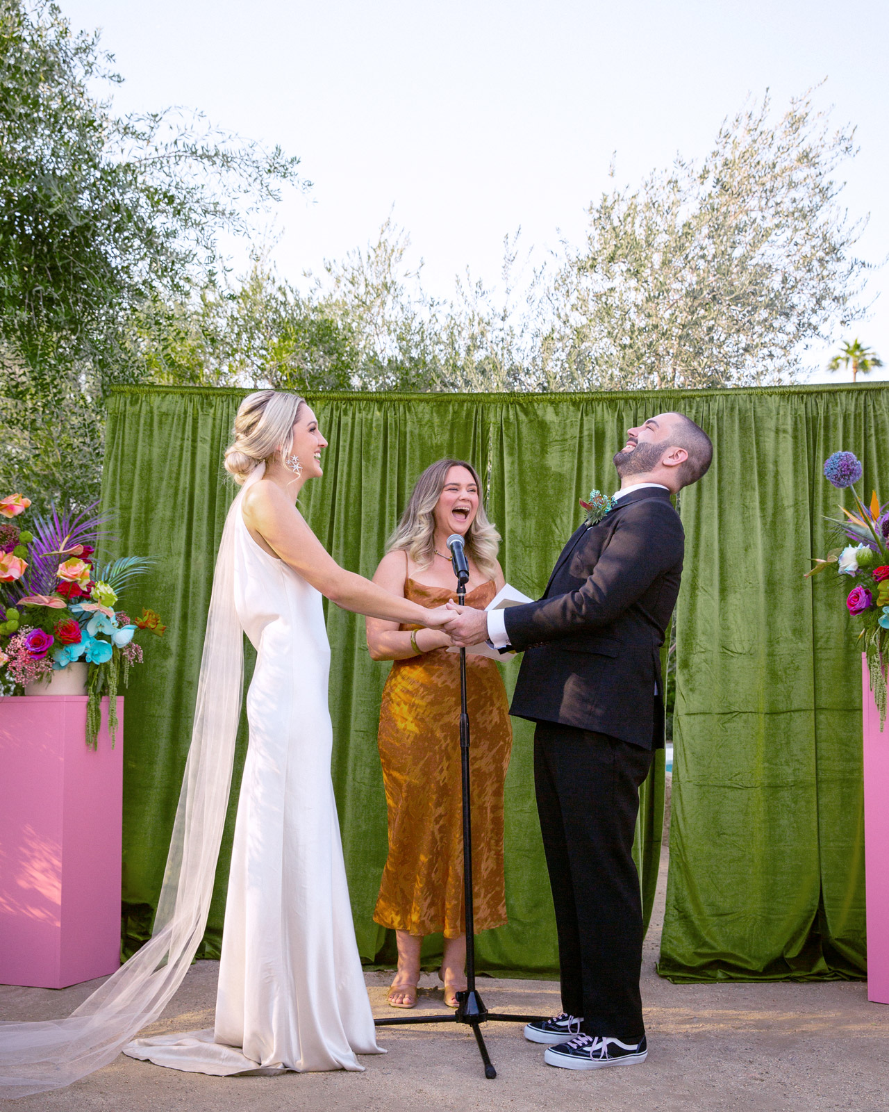 Medium shot of K and B exchanging vowels and laughing. These two met on online dating app.