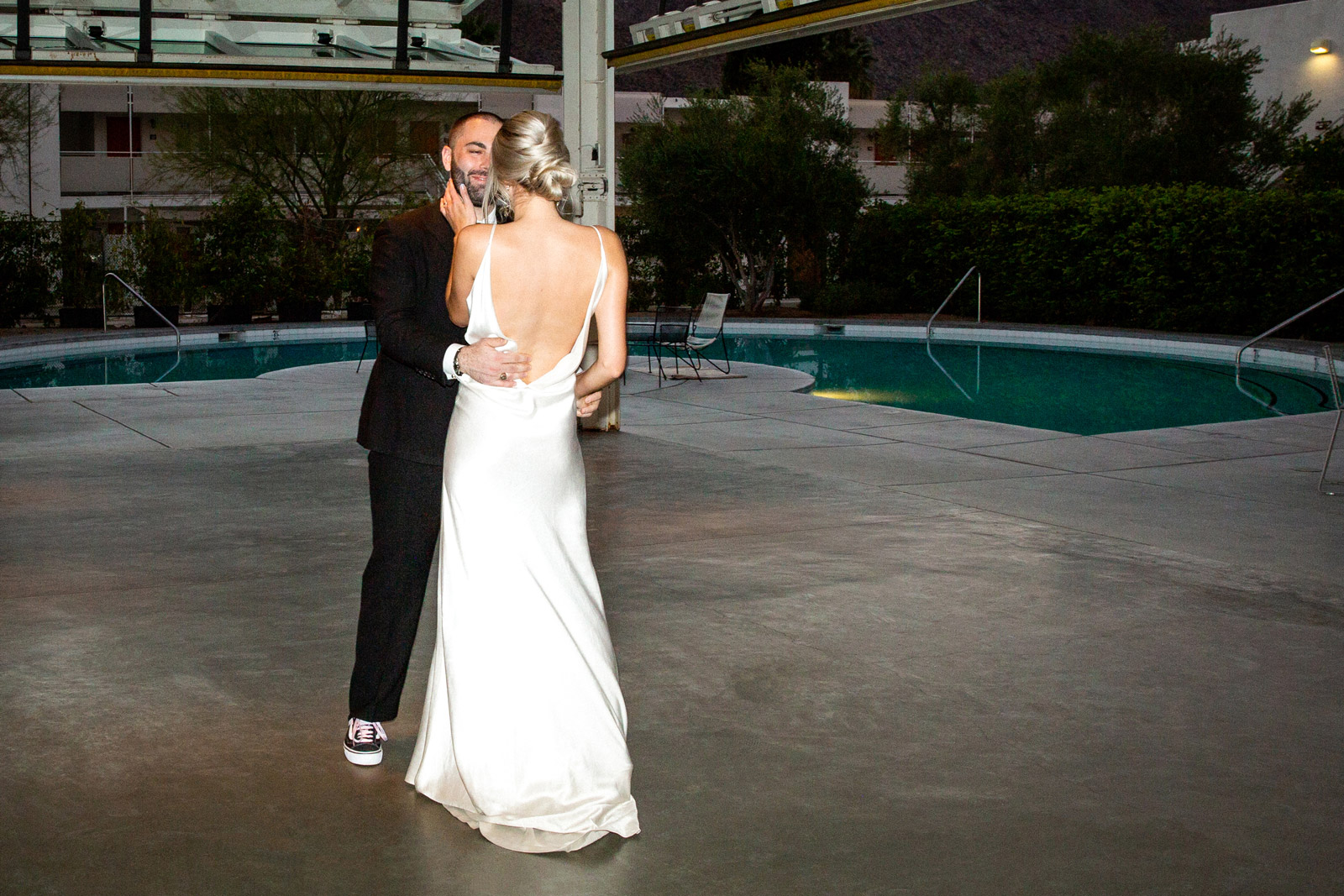 Wide shot of K and B having their first dance to the song “Beyond” by Leon Bridges.